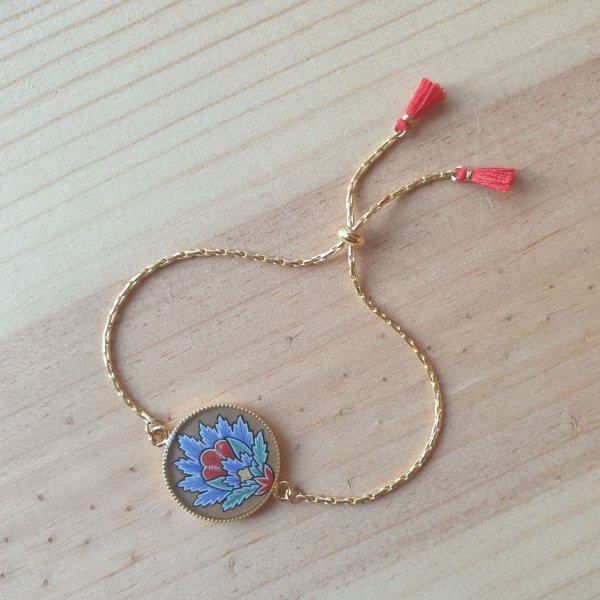Bracelet r&eacute;glable enluminure fleur orientale bleue