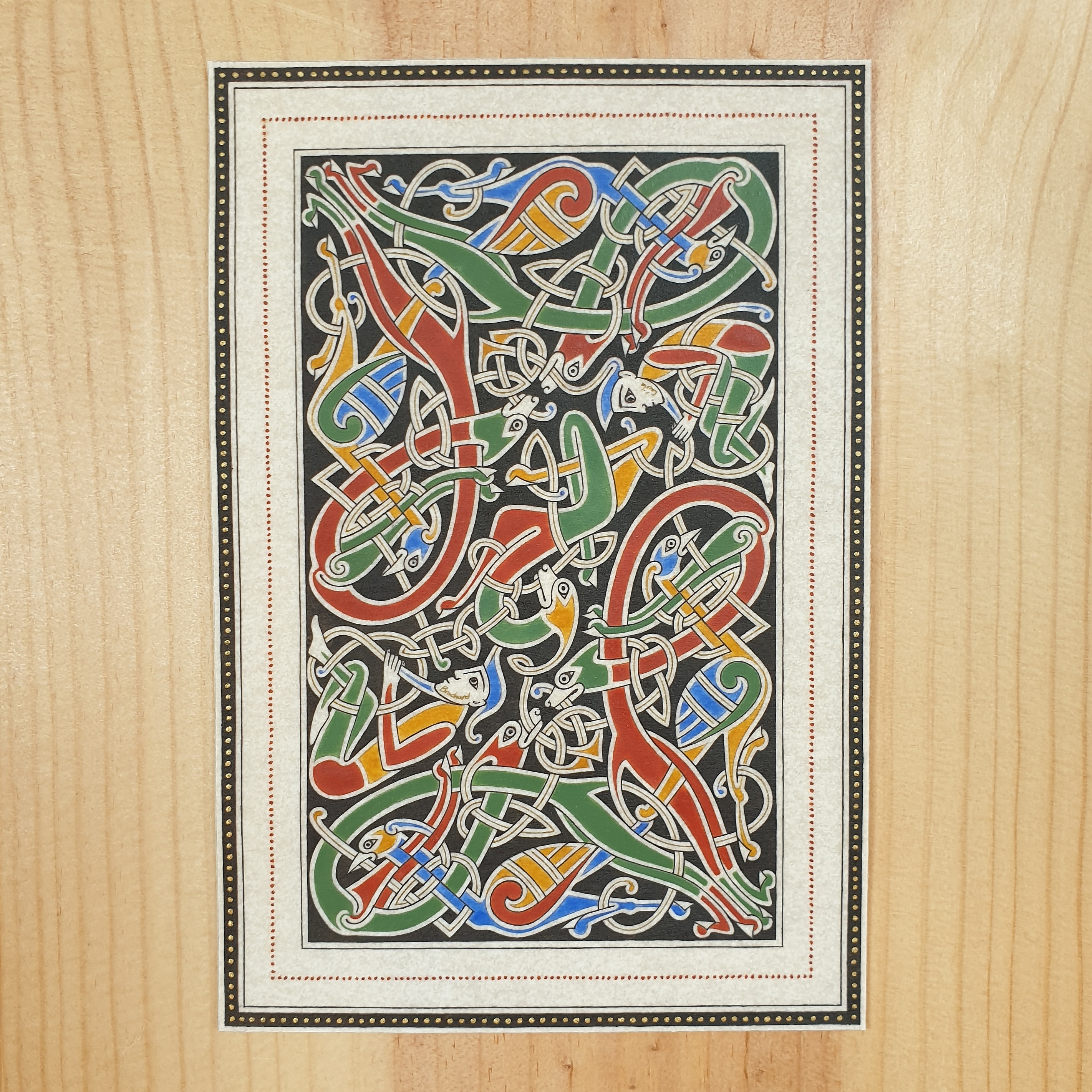 Enluminure insulaire entrelacs zoomorphes