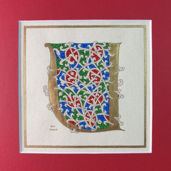 Letra U iluminada en estilo rom&aacute;nico