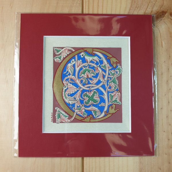 Letra C iluminada en estilo rom&aacute;nico