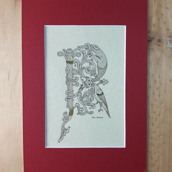 Letra R iluminada en estilo rom&aacute;nico