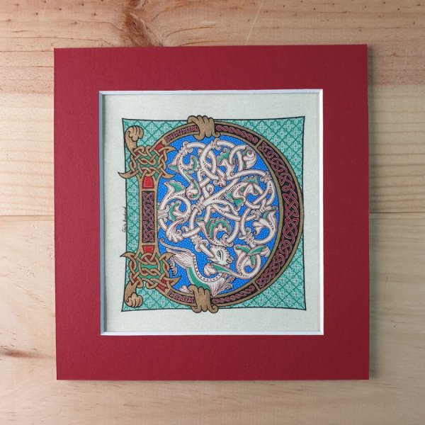 Letra D iluminada en estilo rom&aacute;nico